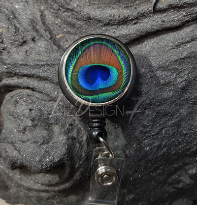 peacock-feather-reel-badge