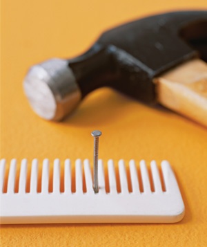 comb nail holder