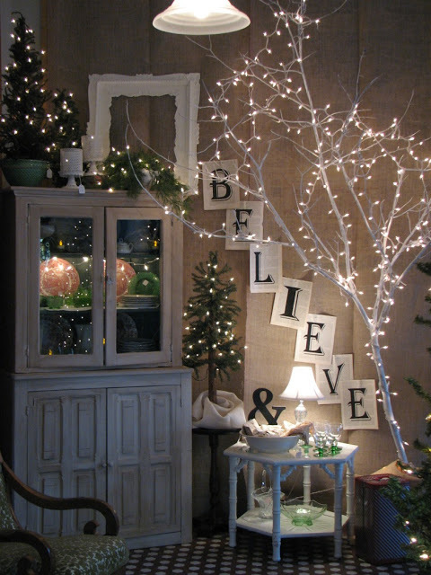 Decorating-with-lighted-branch