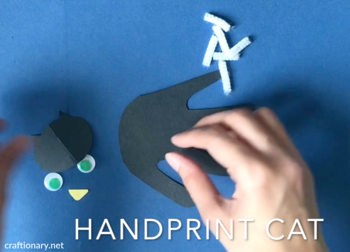 handprint-cat-black-paper-material-supplies