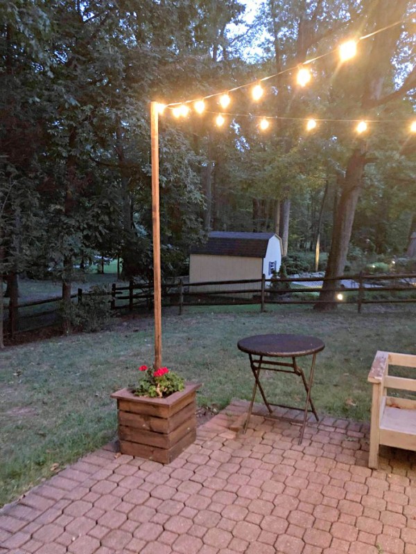 diy-string-light-poles-planters-outdoor-lights
