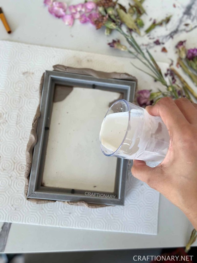 pour plaster of paris and water mixture to make flowers casting art bas relief