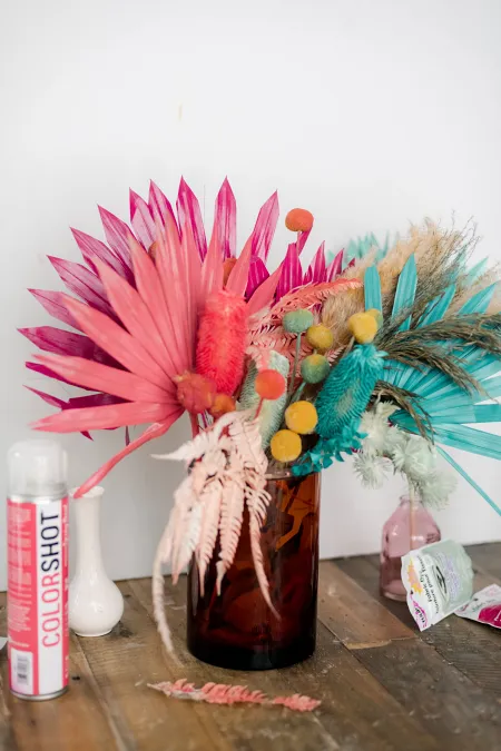 Grasses and Feathers Faux Floral Design With Burgundy Hydrangeas in Bamboo  Motif Vase 