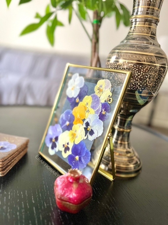 Framed pressed flower in resin hanging frame