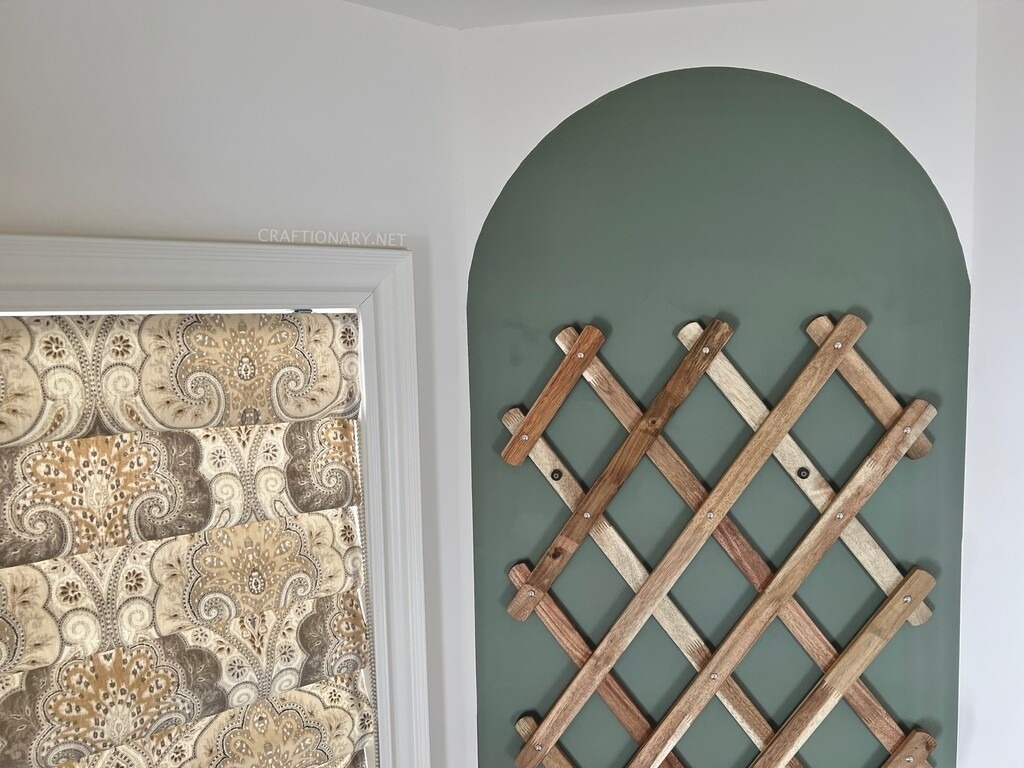 arch-conifer-green-painted-trellis-wall-decor