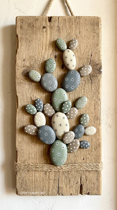pebble-rock-art-cacti-on-wood-board