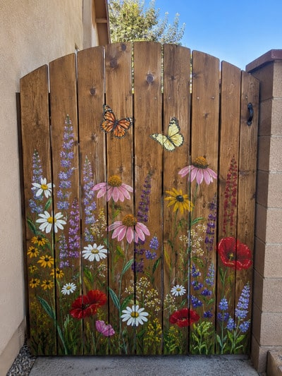 painted-flowers-garden-on-backyard-fence-diy