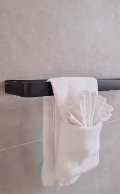 White Bathroom Towel Display with a fan