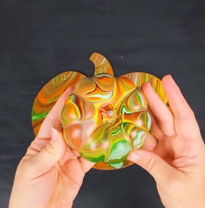 Acrylic Pour on a Pumpkin Over a Pumpkin
