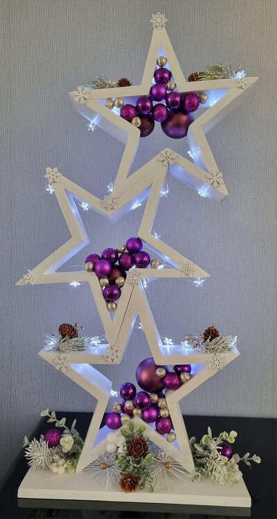 white-star-christmas-decoration-with-silver-and-purple-ornaments