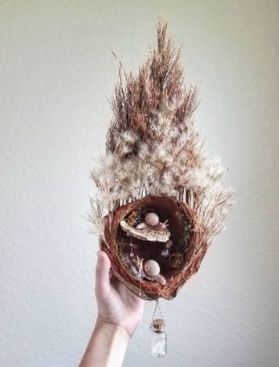 Autumn sculpture with dried flowers