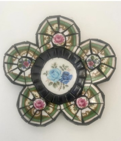 Handmade pique-assiette flower in greens pinks mosaic art home decor.