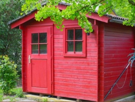 monochromatic garden shed painting.
