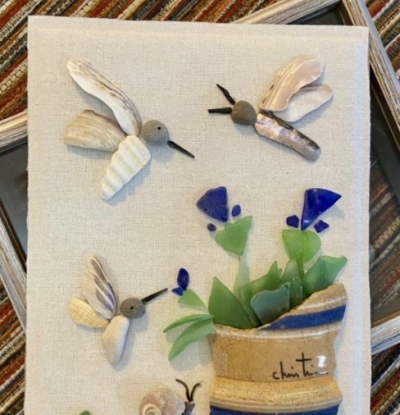 Humming birds on flowers