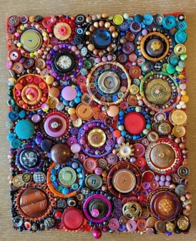 Sewing buttons on a fabric patch