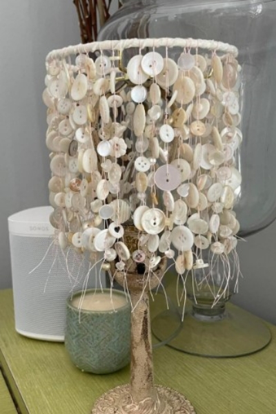 lampshade made using some of the buttons