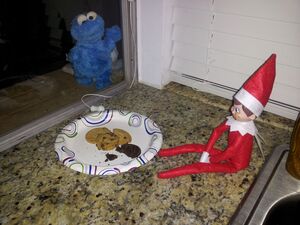 Cookie-Monster-Locked-Outside-while-Elf-eats-cookies