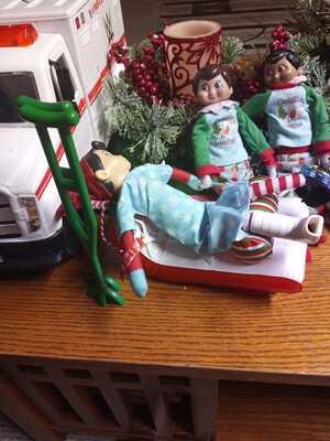 Elf-on-shelf-with-a-Broken-Leg