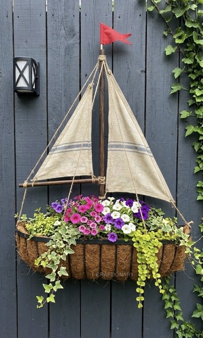 coco-moss-wire-planter-turned-into-a-sailboat-flower-hanger