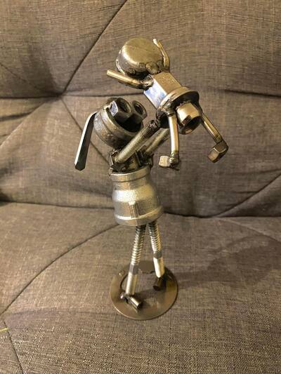 old-tools-art-mother-baby-sculpture