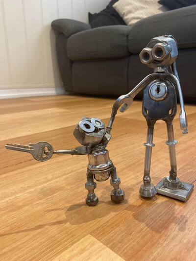 old-tools-art-mother-child-sculpture