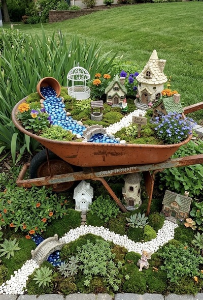 repurposed-wheel-barrow-fairy-garden-front-yard-decor
