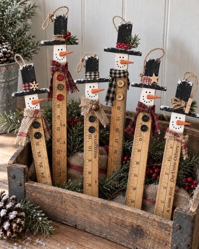 snowmen-made-with-rulers-yardsticks-old-or-broken