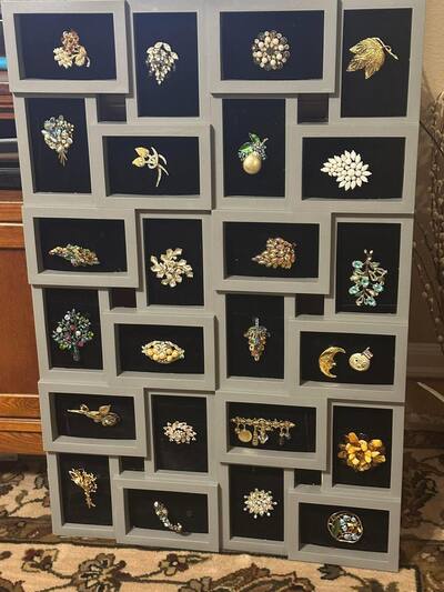 old-brooch-display-picture-frame-art