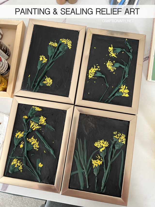 painting-and-sealing-relief-art-plaster-and-clay