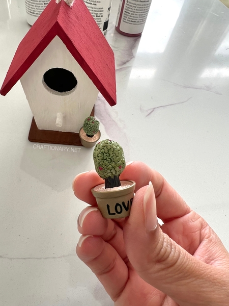 painting-birdhouse-for-garden-crafts