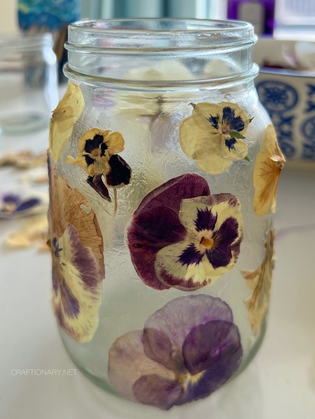 cover-pressed-flowers-pansies-with-mod-podge-to-seal-them-on-mason-jars-spray-uv-sealer