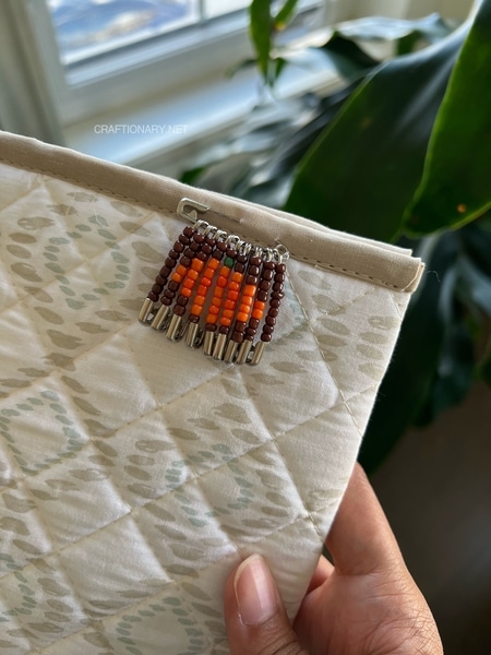 safety-pin-pixel-art-beaded-brooch-as-bookcover